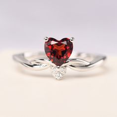 All HANDMADE ITEMS SHIP IN APPROX 8 DAYS Main Stone: Natural garnet Main Stone Size: Heart cut 6 mm x 6 mm Main Stone Weight: 1.15 carat Side Stone: CZ Height From The Ring Setting Bottom(to gemstone top): about 5.5 mm Width of Ring band Measure: gradually varied,about 1.6mm - 2.6 mm Material: 925 Sterling Silver/14K White Gold/14K Yellow Gold/14k Rose Gold Engraved: Available For FreeNo more than 13 letters) Customized:Of course! Tell me what you want Includes With Order: All of my store items Heart-shaped White Gold Birthstone Ring For Valentine's Day, Heart Shaped Ruby Ring In White Gold For Anniversary, White Gold Ruby Ring For Anniversary On Valentine's Day, White Gold Birthstone Ring For Valentine's Day, White Gold Ruby Ring For Valentine's Day Anniversary, Brilliant Cut Birthstone Ring For Valentine's Day, White Gold Heart-shaped Ruby Ring For Anniversary, Formal Heart Cut Birthstone Ring For Valentine's Day, Valentine's Day Solitaire Birthstone Ring For Anniversary