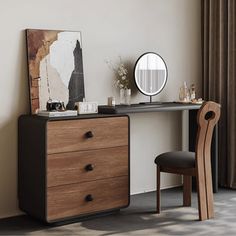 a desk with two drawers and a mirror on it next to a chair in front of a window