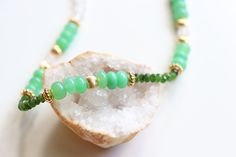 A short handmade necklace full of freshness and pep. Chrysoprase: Gentleness, compassion, reduces anger and improves self-confidence. Chromium diopside: Protective stone, soothes stress and regulates emotional disorders. White Labradorite: Symbol of femininity, promotes intuition and premonitory dreams, promotes gentleness. COMPOSITION : This necklace is made up of 18 smooth 7/8 mm AA grade chrysoprase rondelle beads, 10 3/4 mm faceted chrome diopside rondelle beads and 34 5.5 mm AA grade white Green Gemstone Beaded Necklace For Healing, Green Hand-strung Crystal Necklaces For Healing, Green Hand-strung Crystal Necklace For Healing, Green Healing Crystal Necklace Hand-strung, Handmade Green Emerald Chrysoprase Necklace, Spiritual Green Hand-strung Crystal Necklaces, Green Chrysoprase Gemstone Beaded Necklaces, Green Chrysoprase Gemstone Beads Necklace, Green Chrysoprase Beaded Necklace With Gemstone Beads