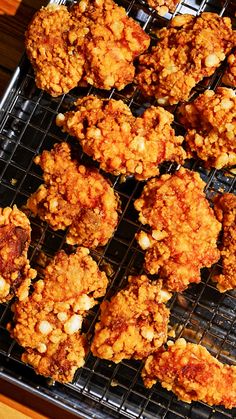 several fried food items on a cooling rack