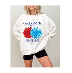 This sweater is great for cheer moms, cheer dads, and anyone looking to scream loud for their favorite cheerleader.  Personalized with your cheerleaders name on the sleeve this makes the perfect look for the games! PERSONALIZATION:  Add your team colors, state/city/region and cheerleaders name.  For custom personalization beyond what you see, please reach out!  I'd be happy to work with you and your team.  📣  SWEATSHIRT DETAILS ▪️ 50% cotton, 50% polyester ▪️ Medium-heavy fabric ▪️ Loose fit ▪️ School Spirit Graphic Print Sweatshirt For Cheerleading, Cotton Graphic Print Sweatshirt For Cheerleading, White Team Spirit Sweatshirt For Cheerleading, White Cheerleading Fan Apparel Sweatshirt, Cheer Team Shirts, Cheerleading Shirts, Sweatshirt Details, Pom Pom Girl, Bow Shirt