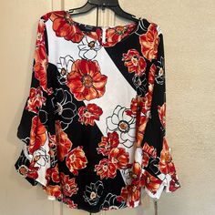 New With Tags. Pullover. Zippers Down The Back Of Neck. Very Long Shirt. Underarm To Underarm Measures 24 Inches. Measured From The Back-Middle Of Neck To The Bottom Of Shirt 29 Inches. Top Of Sleeve To End Of Sleeve Measures 22 Inches. Floral Ruffle, Modern Floral, Long Shirt, Black Orange, Floral Blouse, Orange Black, Bell Sleeves, Floral Tops, Rv