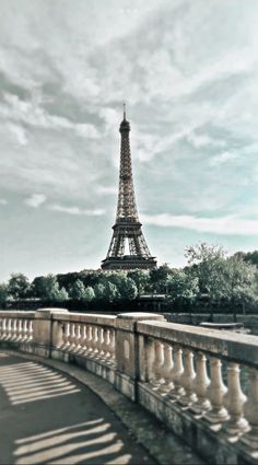 the eiffel tower in paris, france is seen from across the river seine