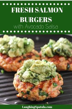 grilled salmon burgers with avocado salsa on a grilling pan in the kitchen