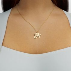 Our Plain Eye of Horus (Ra) Necklace is a simple yet elegant piece of jewelry. Available in either solid gold or sterling silver, this necklace features the iconic Eye of Horus symbol. The Eye of Horus symbolizes protection, healing, and wisdom, and has been revered in ancient Egyptian culture for centuries. With its timeless design and powerful symbolism, this necklace is perfect for everyday wear or special occasions. Add it to your collection today and channel the power of the Eye of Horus! Symbolic White Gold Tarnish-resistant Necklace, Symbolic Gold Plated Necklace With Polished Finish, Symbolic 14k Gold Pendant Necklace, Symbolic 14k Rose Gold Necklace, Symbolic Rose Gold Plated Jewelry, Symbolic 14k Gold Necklaces, Spiritual 14k Gold Initial Pendant Jewelry, 14k Gold Spiritual Initial Pendant Jewelry, Symbolic 14k Gold Necklace