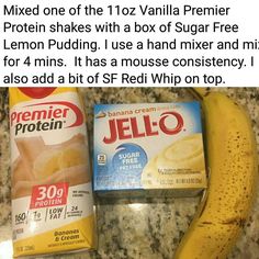 two boxes of jello and a banana on a counter