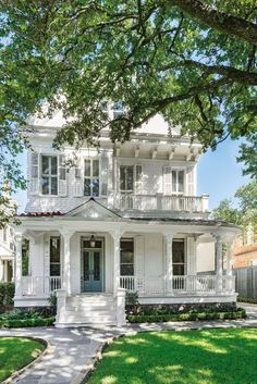 a large white house with lots of windows