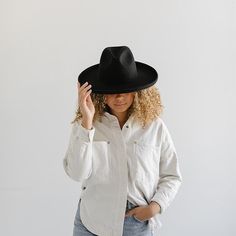 Distinctive and chic, the Maude wide brim fedora hat is inspired by our love of neutrals and modern shapes taken from traditional silhouettes. The unique curves and subtle pinch of the crown on this wide brim felt hat creates a modern take on a classic felt fedora shape. With a wide pencil roll brim, the Maude felt fedora is set apart from the rest. Chic Flat Brim Felt Hat For Everyday, Chic Flat Brim Felt Hat, Chic Everyday Felt Hat With Short Brim, Chic Everyday Felt Hat With Flat Brim, Chic Solid Color Panama Hat With Curved Brim, Modern Wide Brim Fedora For Everyday, Modern Wide Brim Hat For Everyday, Modern Curved Brim Felt Hat For Fall, Modern Wide Brim Felt Hat For Fall