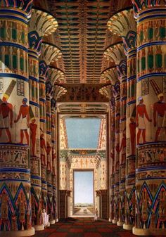 an ornate hallway with columns and paintings on the walls