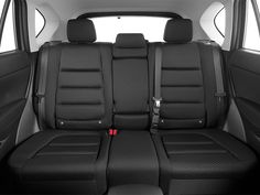 the back seats of a car are empty