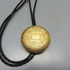 Hand Made Golden Locket Bolo Tie, Victorian Style Working Locket Bolo Tie by PandPF on Etsy Handmade Elegant Bolo Ties As A Gift, Gold Bolo Ties With Adjustable Cord As Gift, Gold Bolo Ties With Adjustable Cord For Gifts, Adjustable Gold Bolo Tie As Gift, Handmade Elegant Bolo Ties For Gift, Gold Adjustable Cord Bolo Ties For Gift, Adjustable Engraved Jewelry From Vintage Collection, Handmade Gold Bolo Tie For Gift, Handmade Bolo Ties As Unique Gifts