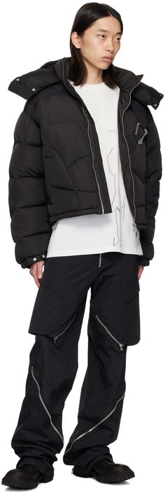 Down-filled quilted polyester taffeta jacket. · Bungee-style drawstring and throat guard at hood · Funnel neck · Two-way zip closure · Carabiner-style hardware at chest · Zip pockets · Bungee-style drawstring at cropped hem · Adjustable press-stud tab at partially elasticized cuffs · Logo embroidered at back · Zip pockets at interior · Full taffeta lining · Logo-engraved silver-tone hardware Supplier color: Black Fill: 90% duck down, 10% duck feather. Streetwear Quilted Down Puffer Jacket, Quilted Down Puffer Jacket For Streetwear, Quilted Duck Down Streetwear Outerwear, Quilted Duck Down Outerwear For Streetwear, Streetwear Quilted Nylon Jacket With Padded Collar, Quilted Down Streetwear Outerwear, Streetwear Quilted Nylon Puffer Jacket, Quilted Down Outerwear For Streetwear, Quilted Nylon Puffer Jacket For Streetwear