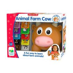 an animal farm cow toy in its box