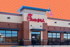 the exterior of a restaurant called cheeto's with an american flag flying above it