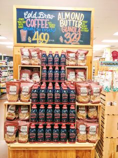 a display in a grocery store filled with lots of different types of food and drinks