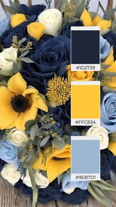 a bouquet with blue and yellow flowers in it, on a wooden table next to a color swatch