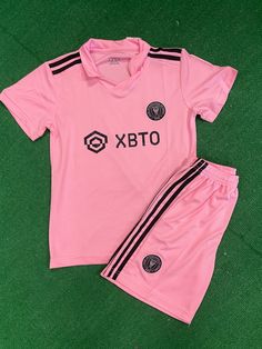 This 2023 fun pink kit with black trim includes jersey and shorts. Made of 100% poly and can be personalized for $10 Pink Jersey, Home 2023, Soccer Shop, Miami Houses, Inter Miami, Youth Soccer, Soccer Shorts, Soccer Kits, Jersey Outfit