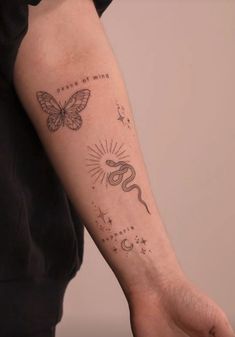 a person with a butterfly tattoo on their arm