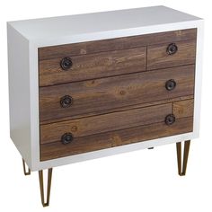 a white and wood dresser with three drawers