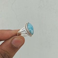 Important : PLEASE ENTER YOUR PHONE NUMBER IN THE "NOTE TO SELLER" SECTION DURING CHECKOUT, SO THAT THE DELIVERY CAN BE HASSLE FREE.Material: Solid Sterling silver Stone: Larimar stone size: varies( According to the ring sizes)ships worldwide from India925 stampedHandmade itemOur products are totally handmade and made with high quality gemstones and 925 solid sterling silver.If you believe in buying top quality products for yourself and for your family and friends, SilverDynasty is the place whe Earth Healing, Larimar Ring, Larimar Rings, Silver Rings With Stones, Larimar Stone, Inner Wisdom, Rainbow Moonstone Ring, Boho Ring, Gem Stones