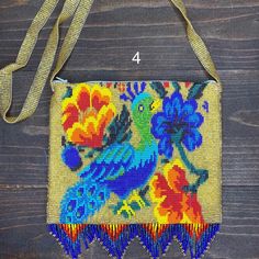 This unique Mexican hand beaded Chaquira crossbody bags are unique. Perfect for any occasion and fun to wear. Add a pop of color to your outfit. Measurements: 8 x 6.5 inches Strap about 21 inches Visit us at Omxboutique.com Everyday Rectangular Shoulder Bag With Colorful Beads, Unique Beaded Bags For Everyday Use, Unique Beaded Everyday Bags, Beaded Shoulder Bag For Festivals Gift, Artisan Beaded Bag As Gift, Beaded Bags For Gifts And Festivals, Artisan Beaded Bags As Gifts, Beaded Bags For Festivals And Gifts, Beaded Bags For Gift And Festivals