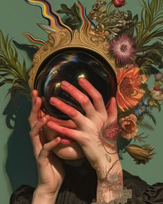 a woman covering her face with her hands and holding a mirror in front of her face