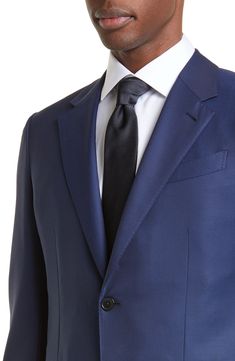 Impeccably tailored from ZEGNA's proprietary, superfine wool fibers, this essential suit boasts a refined micro pattern that adds depth to the classic colorway. Precise pickstitching showcases the label's scrupulous attention to detail. Jacket has notched lapels, four-button cuffs, chest welt pocket, front pocket, side vents Pants have zip fly 100% wool Dry clean Made in Italy Men's Designer Clothing Timeless Silk Suits For Business Casual, Timeless Silk Business Casual Suits, Silk Notch Lapel Suit For Business Casual, Solid Wool Suit For Semi-formal Occasions, Silk Notch Lapel Suits For Business Casual, Solid Wool Suits For Semi-formal Occasions, Silk Suits With Notch Lapel For Business Casual, Semi-formal Solid Wool Suits, Luxury Silk Business Casual Suits