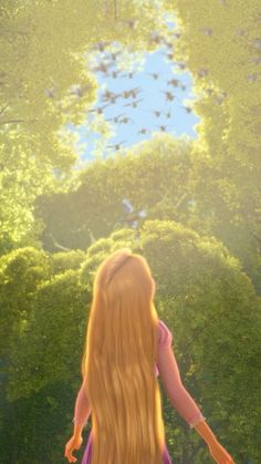 a girl with long red hair walking in the woods looking up at trees and blue sky