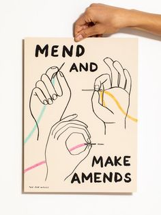 someone holding up a poster with writing on it that says mend and make amends