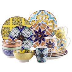 an assortment of colorful dishes and cups