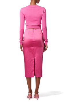 Carolina Herrera long sleeve cardigan in rose. 55%SE 45%CO Dry Clean Made in China Feminine Fitted Long Sleeve Cardigan, Fitted Long Sleeve Feminine Cardigan, Pink Fitted Elegant Sweater, Feminine Long Sleeve Evening Outerwear, Chic Pink Sweater For Work, Elegant Pink V-neck Cardigan, Chic Pink V-neck Cardigan, Feminine Pink Long Sleeve Cardigan, Pink Fitted V-neck Outerwear