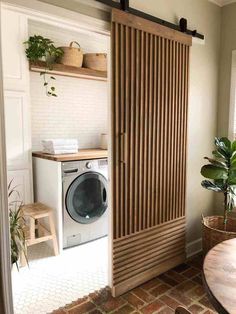 a washer and dryer in a small room