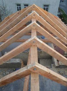 the roof is being built with wooden beams