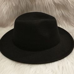 Beautiful Fedora Hat New. Good For Any Occasion And Great For A Gift . This Fedora Hat Is Breathable, Lightweight And Comfortable For All Day. Material : 65% Cotton , 35% Polyester And Has An Adjustable Strap Inside. Hat Circumference :About 58- 60cm/ 22.8"- 23.6" Brim Width : About 8cm/ 3.15 Height : 12cm/ 4.73" Black Casual Felt Hat For Party, Black Casual Felt Hat One Size, Black Casual Felt Hat, Casual Black Felt Hat For Party, Casual Black Felt Hat One Size, Black Casual Felt Hat One Size Fits Most, Adjustable Black Felt Bucket Hat, Black Fedora For Beach Fall Season, Casual Black Felt Hat For Beach