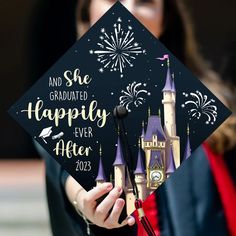 a graduation cap that says and she graduated happily ever after 2012 with fireworks in the background