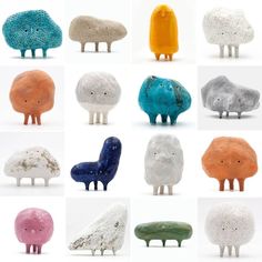 six different colored sheep sculptures sitting next to each other on top of a white surface