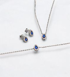 Royal Blue Bridal Jewelry Set, is perfect for your loved one. A perfect gift for mom, daughter, wife, girlfriend, classmates and friends. A clear choice for Graduation Gift, Mother's Day gift, Valentine's Day gift, a uniquely beautiful necklace that you can treasure forever. Adding a new dimension to your colorful diamond. Get your newest piece to elevate your outfit because, remember, your day deserves a dark blue whisper just like the beautiful seas. You may also like this bracelet suitable for this set. https://www.etsy.com/uk/listing/1334603472/925-sterling-silver-blue-sapphire Necklace chain length is 18''. * Handmade with love ♡ * Material: 925 Sterling Silver * Finish: 18K Gold, 18k Rose Gold, 925 Sterling Silver * Package: All Jewelry will be carefully packaged and sent in a beauti Blue Cubic Zirconia Jewelry Gift, Blue Cubic Zirconia Necklace With Matching Earrings, Sapphire Cubic Zirconia Jewelry Sets, Teardrop Sapphire Cubic Zirconia Jewelry, Teardrop Sapphire-colored Cubic Zirconia Jewelry, Sapphire Sterling Silver Jewelry Hand Set, Hypoallergenic Cubic Zirconia Jewelry For Mother's Day, Blue Hypoallergenic Jewelry For Mother's Day, Blue Fine Jewelry For Gifts