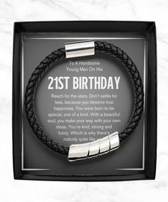 a black leather bracelet with the words 21st birthday on it