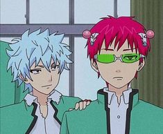 two anime characters one with pink hair and the other wearing green glasses, standing next to each other