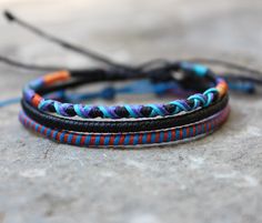 1 multicolor wrap bracelet  1 black wrap bracelet 1 multicolor spiral bracelet Adjustable 1 have Burudiguru charm Casual Hand Wrapped Multicolor Wrap Bracelet, Casual Hand-wrapped Multicolor Wrap Bracelet, Casual Multicolor Hand Wrapped Wrap Bracelet, Adjustable Hand Wrapped Multicolor Leather Bracelet, Adjustable Multicolor Leather Friendship Bracelet, Multicolor Wrap Bracelet With Sliding Knot, Multicolor Wrap Bracelet With Sliding Knot As Gift, Multicolor Wrap Bracelet With Sliding Knot For Gift, Multicolor Hand Wrapped Leather Bracelet As Gift