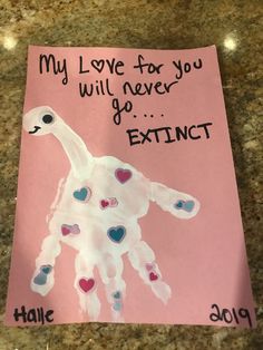 a handprinted card with an image of a giraffe on it that says, my love for you will never be extinct