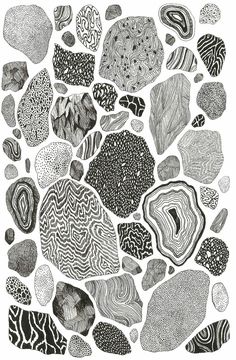 black and white drawing of rocks with different patterns on them, including one in the middle