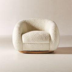 a white chair sitting on top of a table