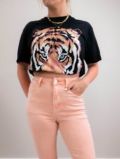 The vivid colors on this tiger tee make it a go-to for standing out in the crowd. This tee looks great under a denim jacket or front tucked and styled with a bright-colored blazer. SIZE & FIT Model is 5'6", wearing size small Graphic Print T-shirt With 3/4 Sleeves, Tiger Graphic Tee, Casual Tiger Print T-shirt For Summer, Casual Summer T-shirt With Tiger Print, Summer Casual Tiger Print T-shirt, Casual Summer Tiger Print T-shirt, Summer Cotton Tops With Tiger Print, Trendy Tan Tops For Spring, Casual Tiger Print Tops