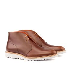 Get the best price now on Ambrogio Bespoke Custom Men's Shoes Cognac Polished Calf-Skin Leather Chukka Boots (AMB1939) Material: Polished Calf-Skin Leather Hardware: None Color: Cognac Outer Sole: Rubber Sole Hand-Painted Calf-Skin Leather Upper Calf-Skin Leather Insole Zurigo Toe Shape Comes with original box and dust Chuka Boots, Chukka Shoes, Leather Chukka Boots, Custom Design Shoes, Dress Well, Chukka Boot, Desert Boots, Men Looks, Handmade Shoes