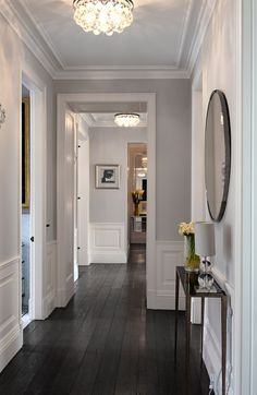 the hallway is clean and ready for us to use as an entrance way in this home