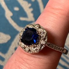 This Gorgeous Genuine Blue Sapphire Ring Has A Charming Floral Setting. Stamped 925 Sterling Silver. Size 8. Nwt. Blue Sapphire Is September Birthstone And This Ring Will Surely Make Her Day! Ring Comes With A Jewelry Cleaning Cloth & Velvet Storage Bag. Shipped In A Gift Box & Gift Wrapping Is Available Upon Request. Feel Free To Make An Offer & Please Check Out My Other Items. Most Reasonable Offers Accepted. I Can Combine Shipping With Other Items. Thanks For Your Interest. Msrp: $109. Blue Sterling Silver Jewelry With Halo Design, Royal Blue Round Jewelry With Center Stone, Dazzling Blue Sapphire Ring In Sterling Silver, Dazzling Blue Sapphire Sterling Silver Ring, Box Gift Wrapping, Velvet Storage, Jewelry Cleaning, Blue Sapphire Ring, Blue Wedding Dresses