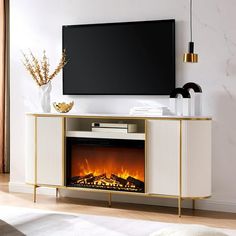 an entertainment center with a fireplace in the middle and a flat screen tv above it