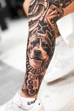 a man with a dog tattoo on his leg