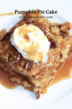 a piece of cake sitting on top of a white plate covered in caramel sauce